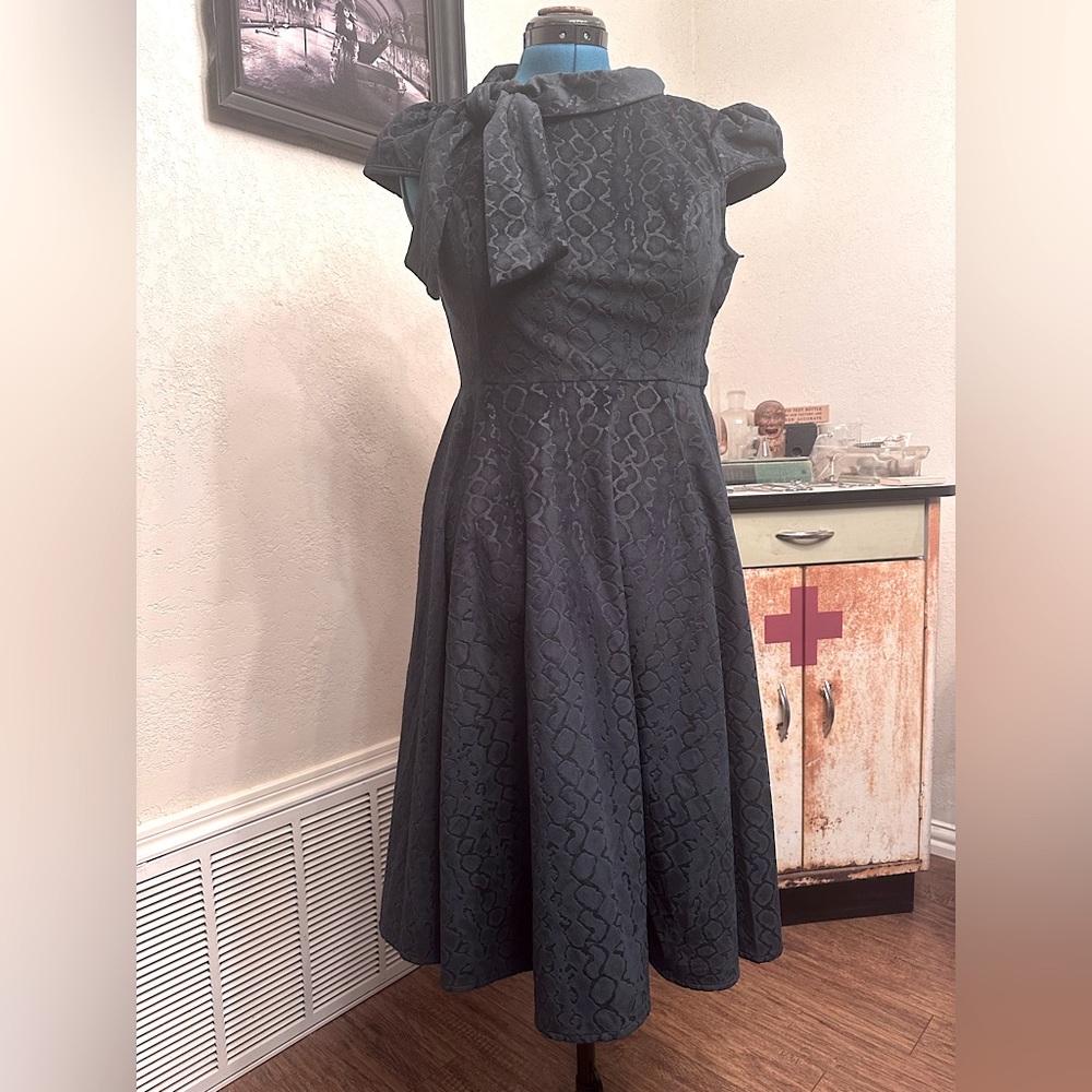 Textured dark green velvet dress